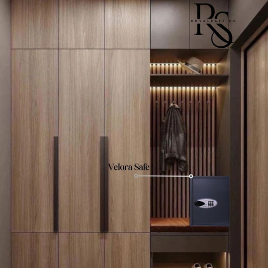 Modern wooden wardrobe and entryway with a black Velora digital safe, leather jacket, hat, and shoes